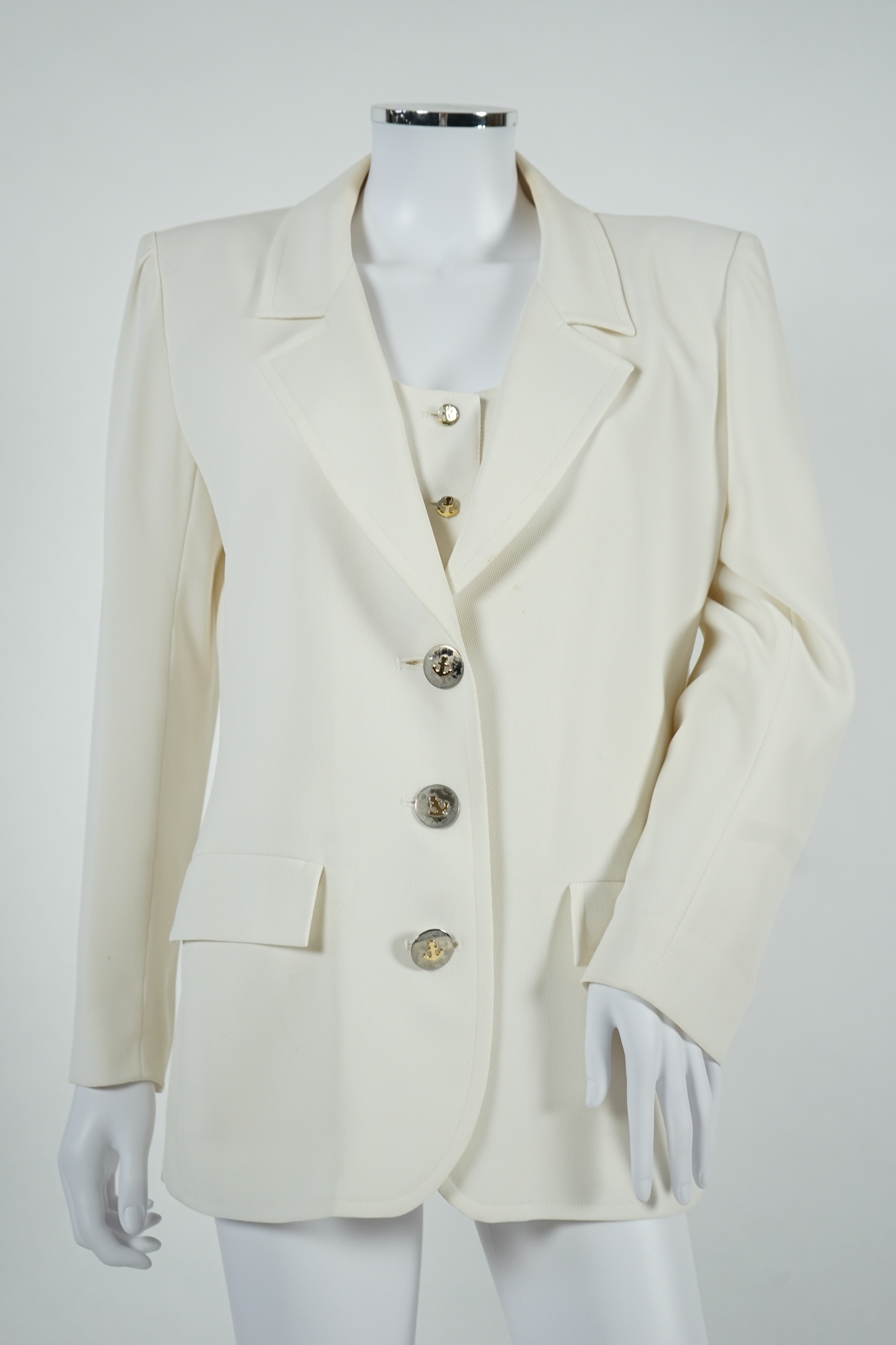 A vintage Yves Saint Laurent variation lady's off white three piece trouser suit with skirt (four pieces), F 40 (UK 12). Proceeds to Happy Paws Puppy Rescue